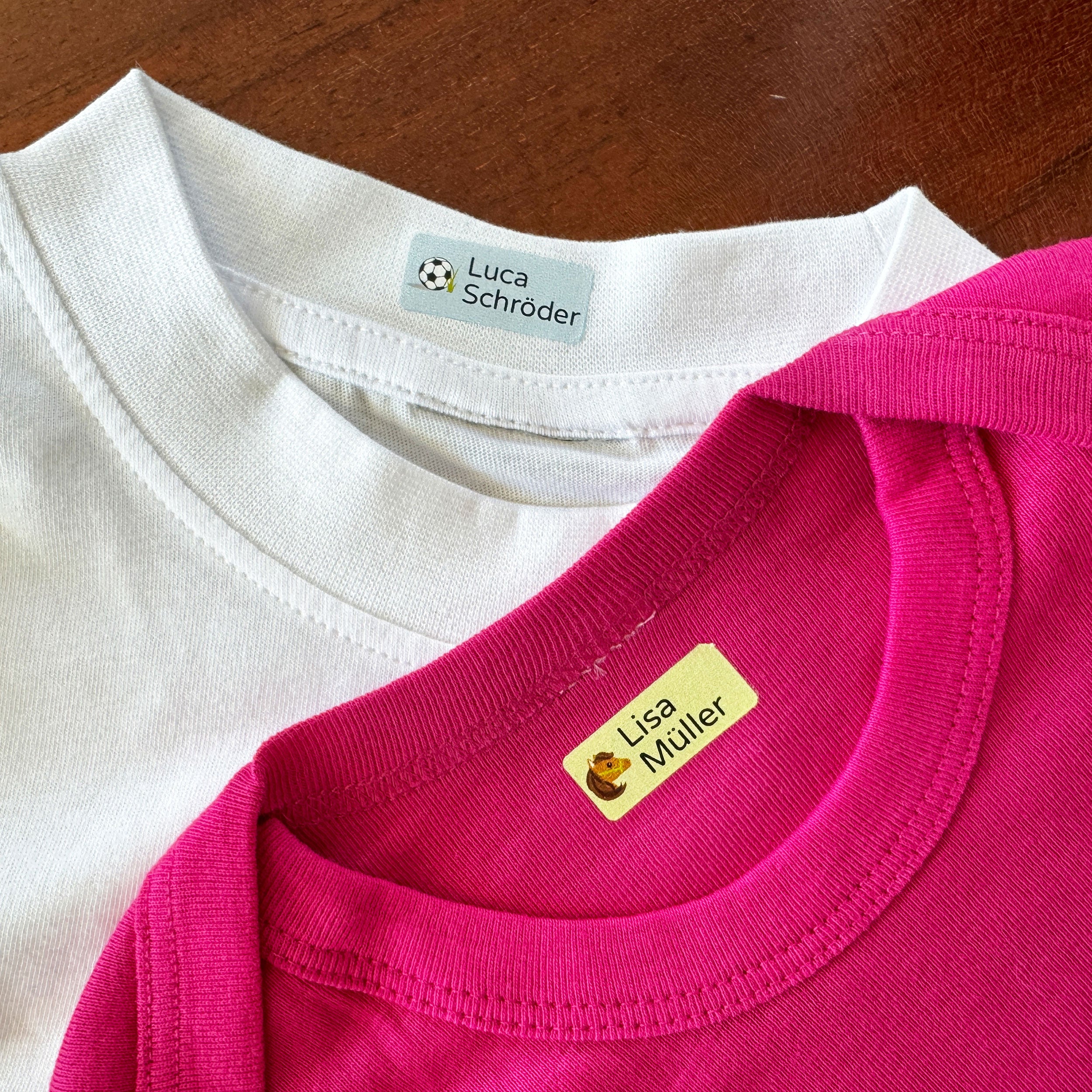 Bügeletiketten mit Namen (30x13 mm 225 Stück zum Aufbügeln) - adressaufkleber-fabrik.de